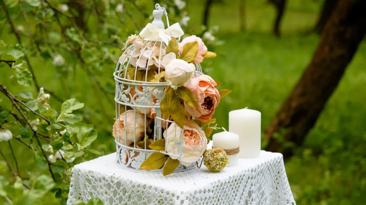 pink flowers candles on knitted cloth the decor on the