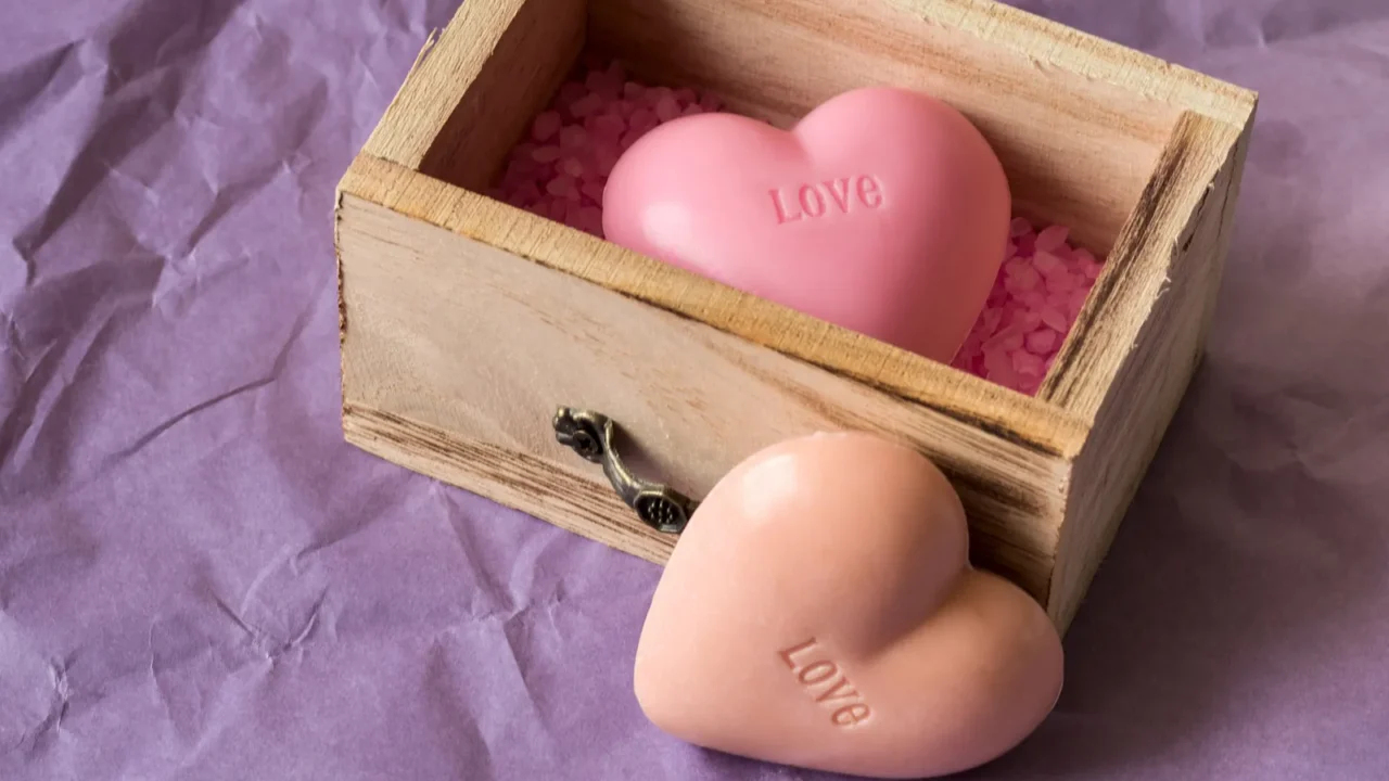 spa and wellness concept wooden box with pink sea salt