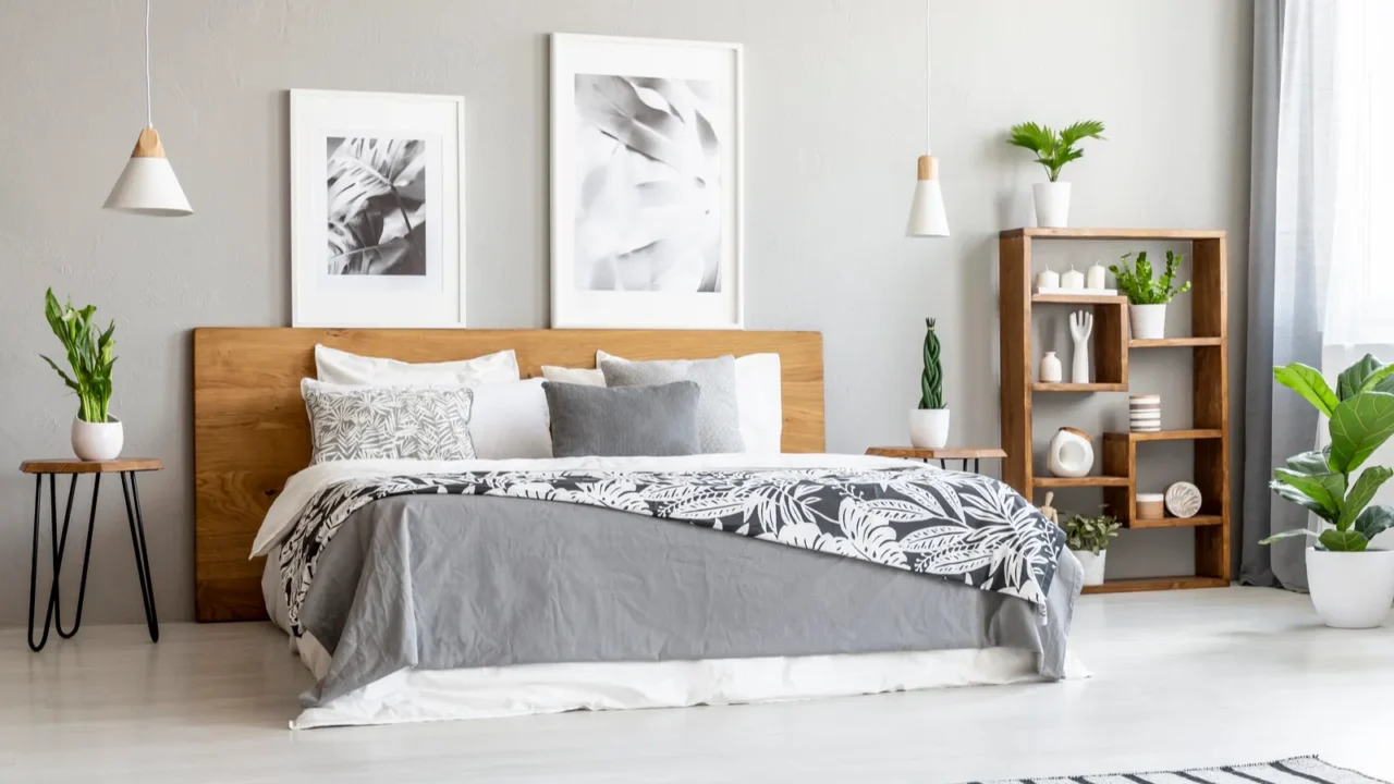 striped carpet in spacious bright bedroom interior with posters above