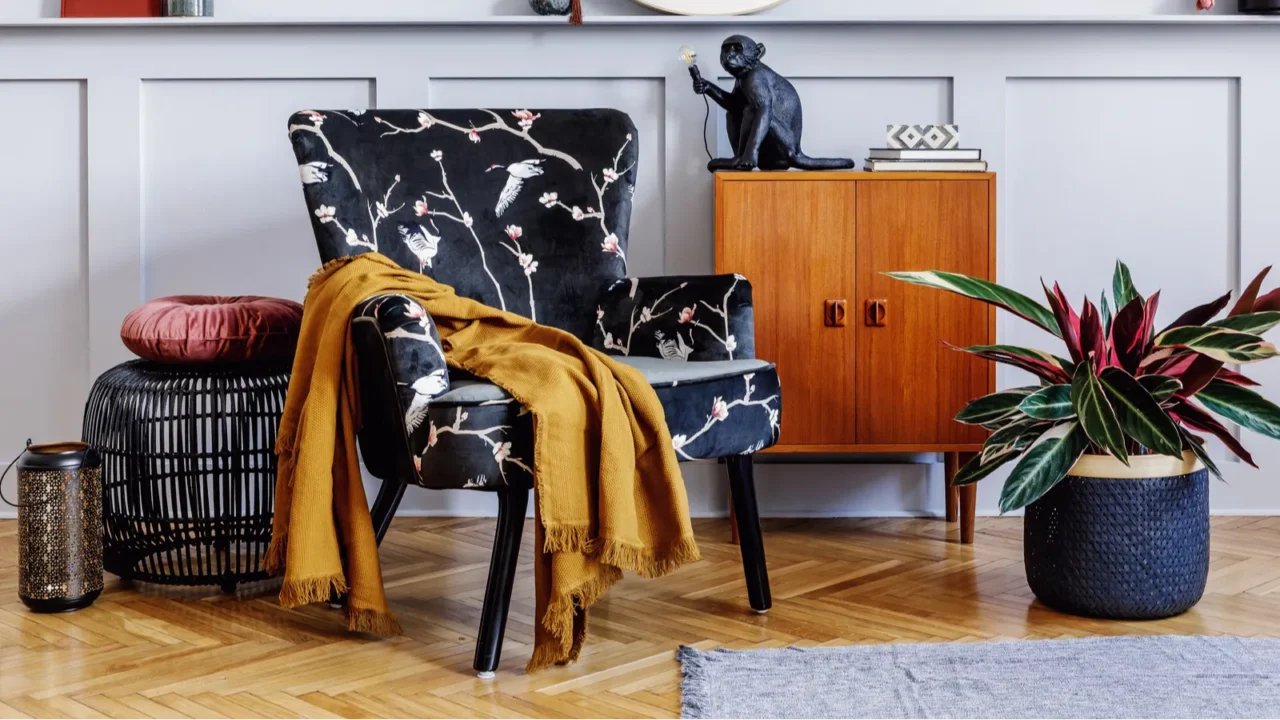 stylish interior of living room with design armchair wooden vintage