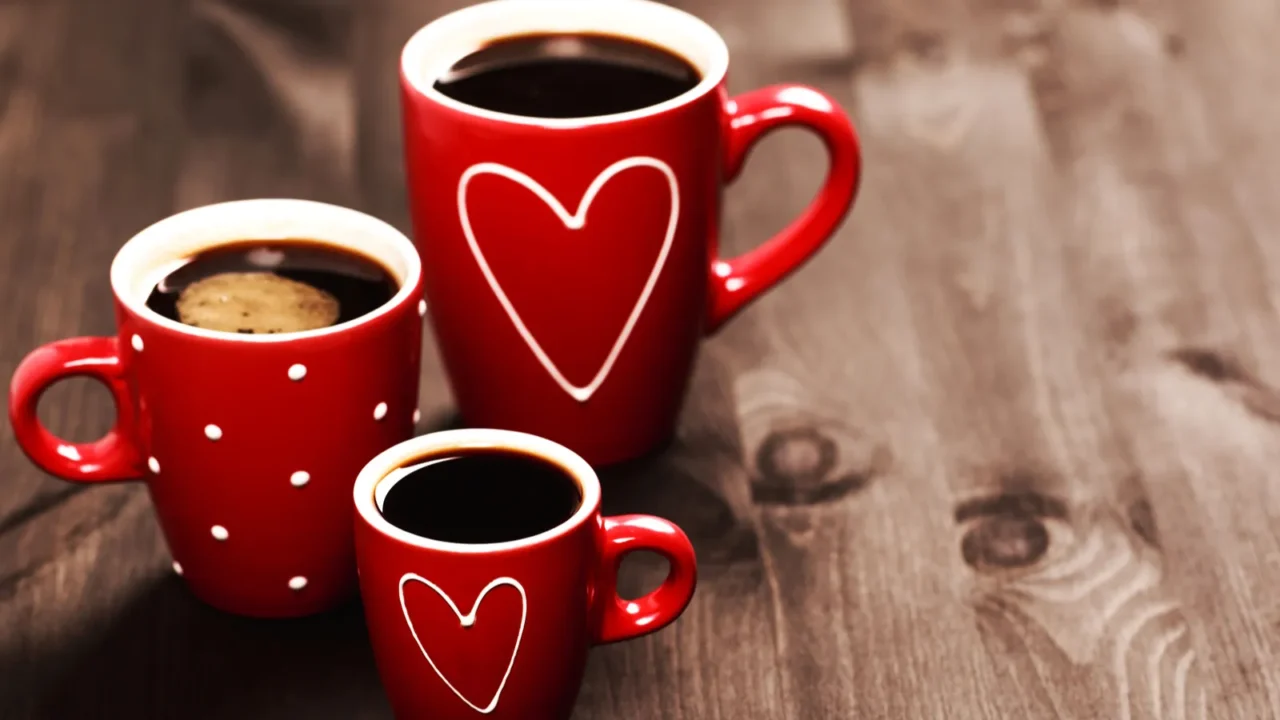 three red coffee cups