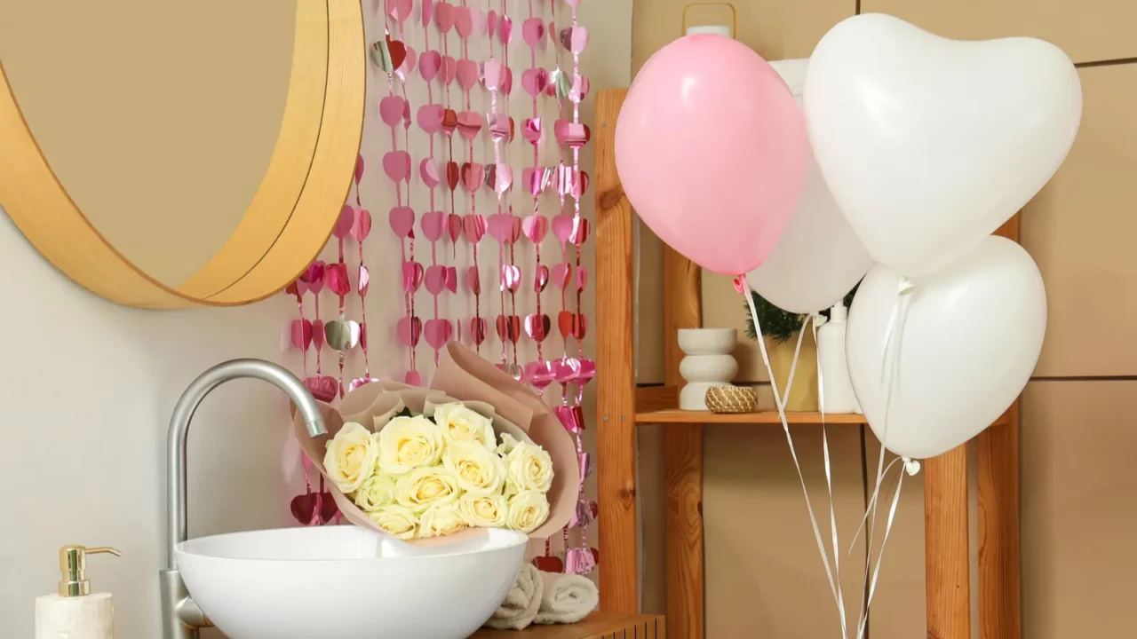 wooden cabinet with bouquet of flowers sink and hearts in