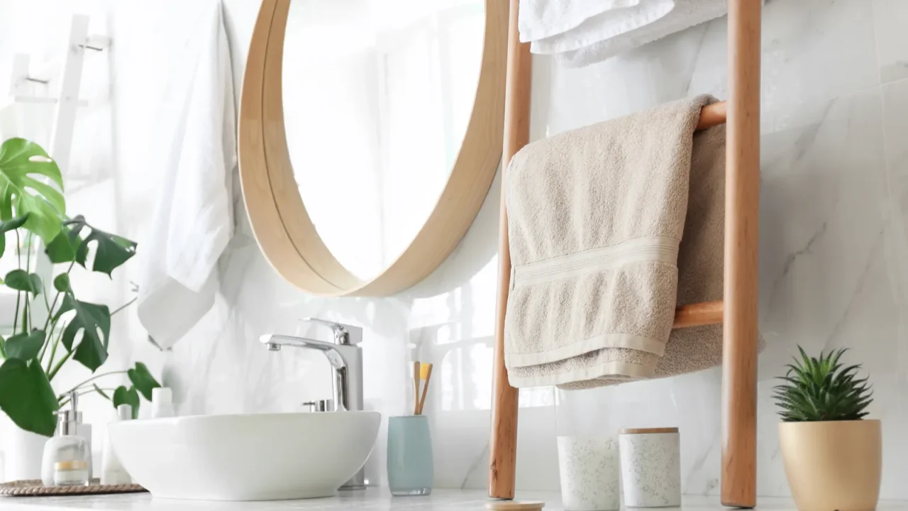 decorative ladder near vessel sink in stylish bathroom idea for