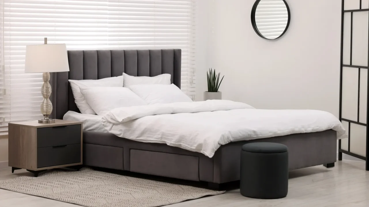 stylish bedroom interior with large bed chest of drawers and