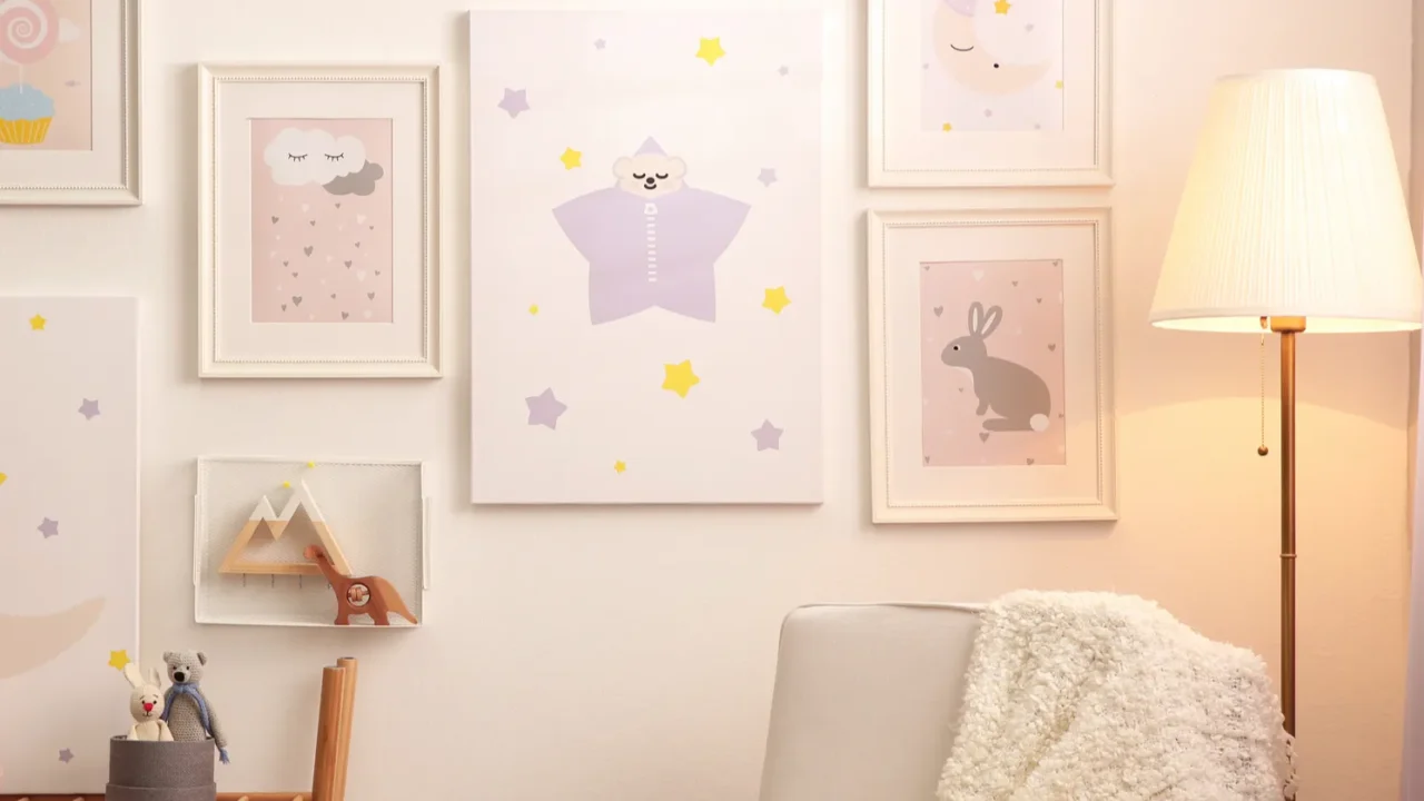 stylish childs room interior with comfortable armchair and beautiful pictures