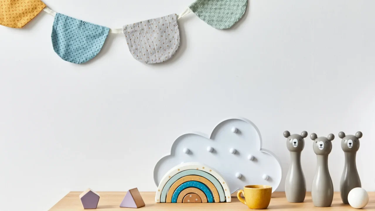 stylish scandinavian newborn baby room with toys plush animal photo
