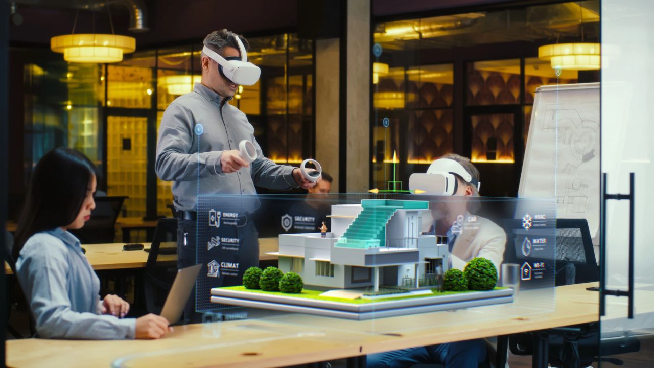 People using VR technology to design a building.