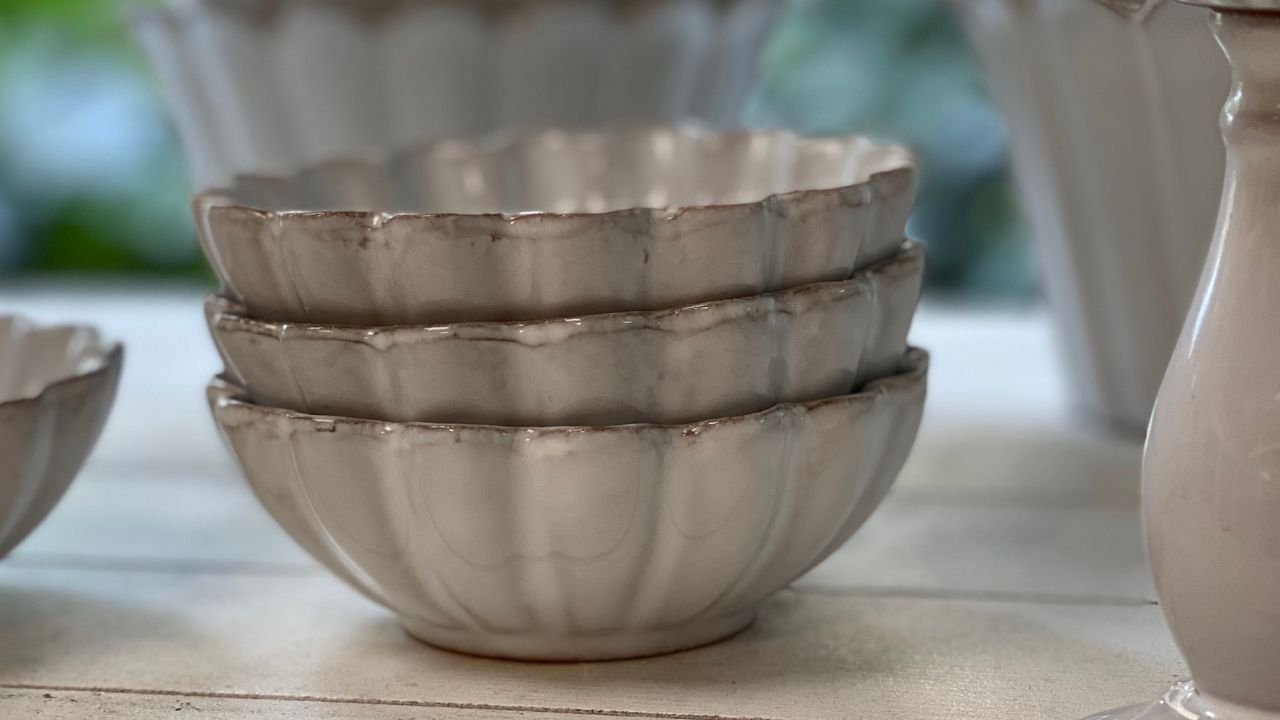 Stacked ceramic bowls in a subtle tone.