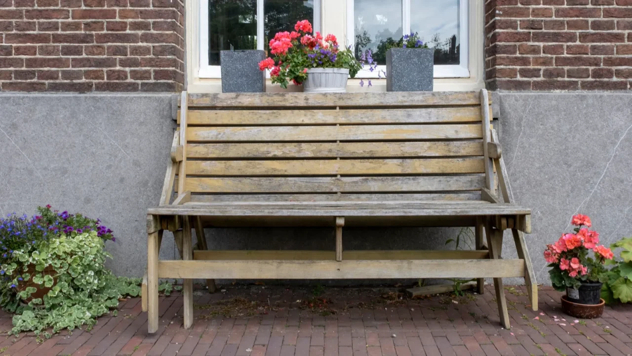 front view of a wooden bench in front of a