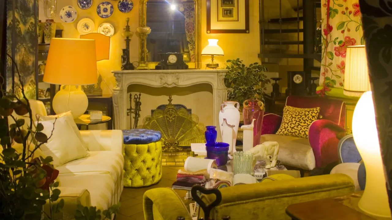 Charming vintage living room with a bright warm glow, displaying a collection of decorative items and furniture.