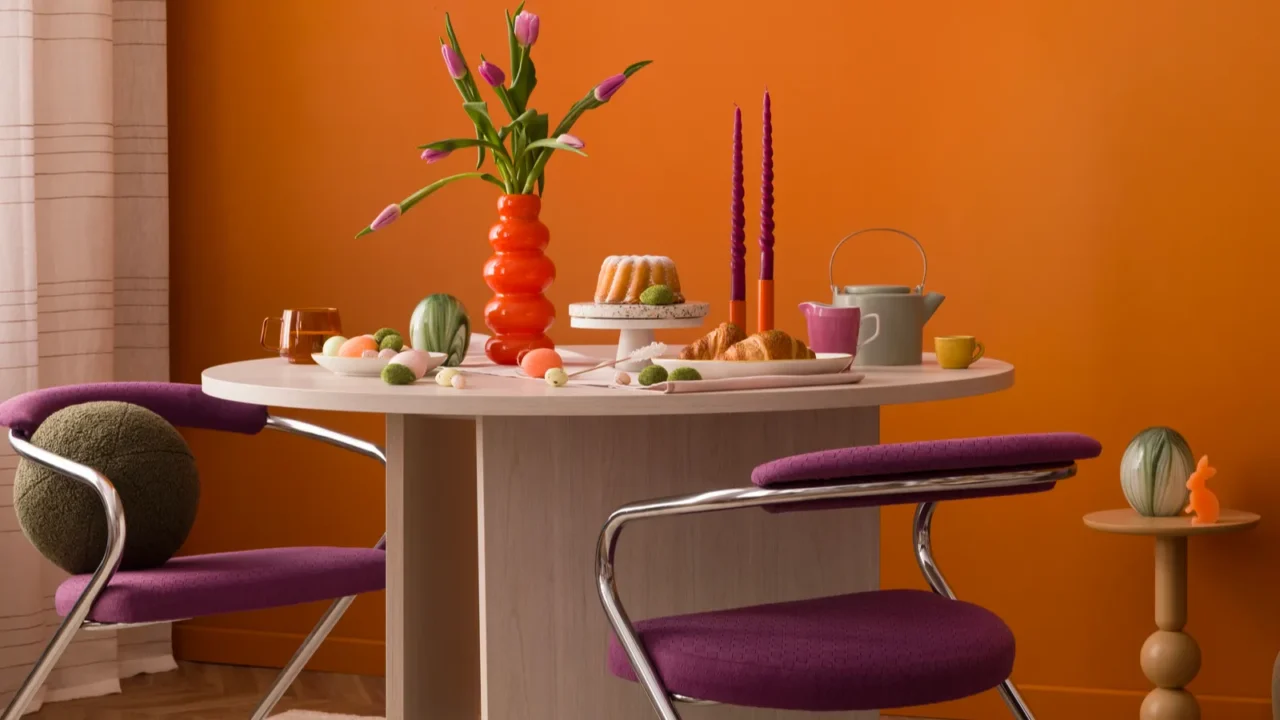 modern easter table setting with pastel decorations tulips ceramic bunnies