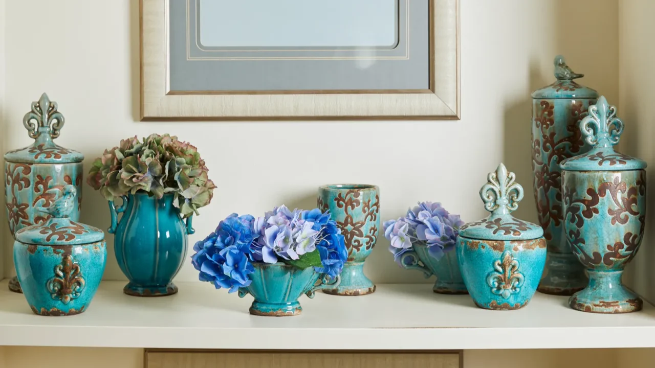 picture frame and turquoise set with flowers on surface