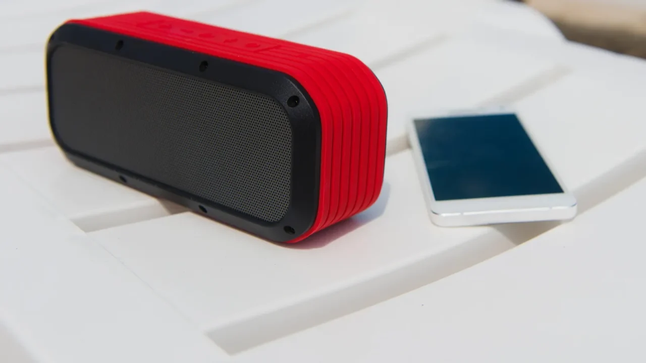portable speaker and smartphone outdoors
