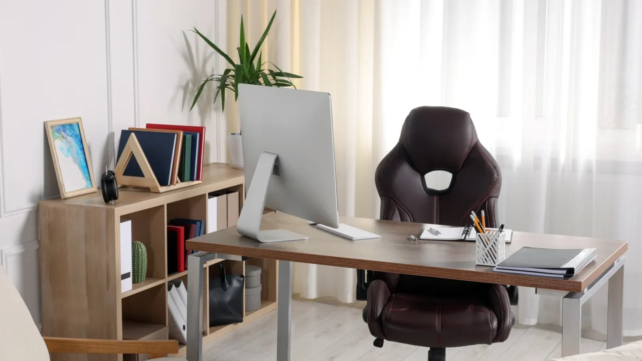 receptionist workplace with computer and waiting area interior design