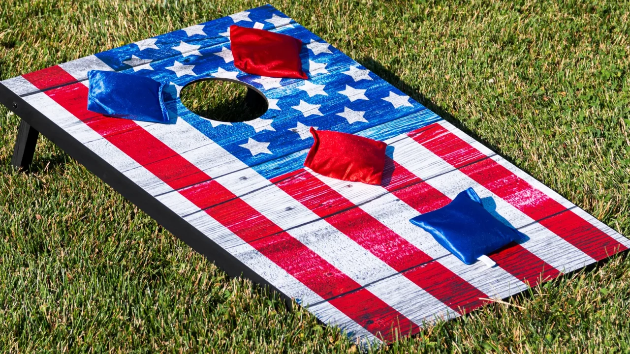 red white and blue cornhole game with stars to look