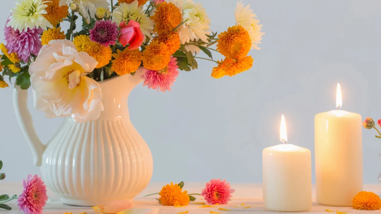 still life with chrysanthemum and burning candles