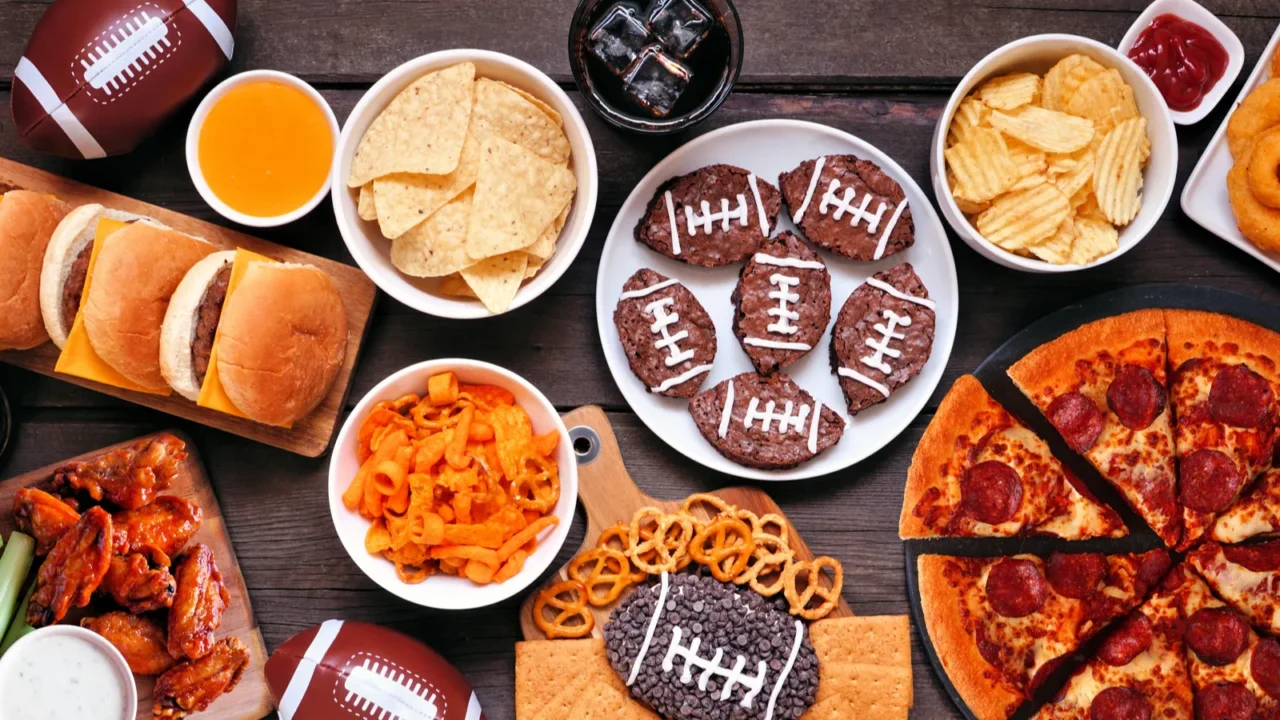 super bowl or football theme food table scene pizza hamburgers