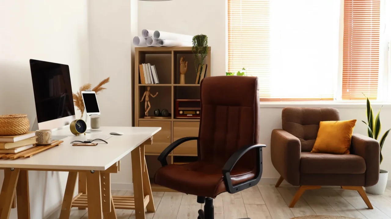 workplace with modern gadgets in light room interior