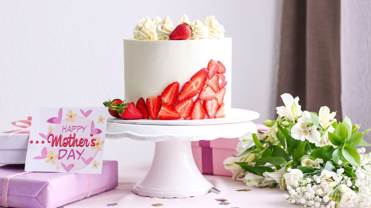 A decorated cake with strawberries and cream for Mother’s Day.
