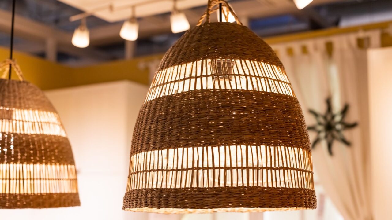 A DIY basket pendant light hanging from the ceiling.