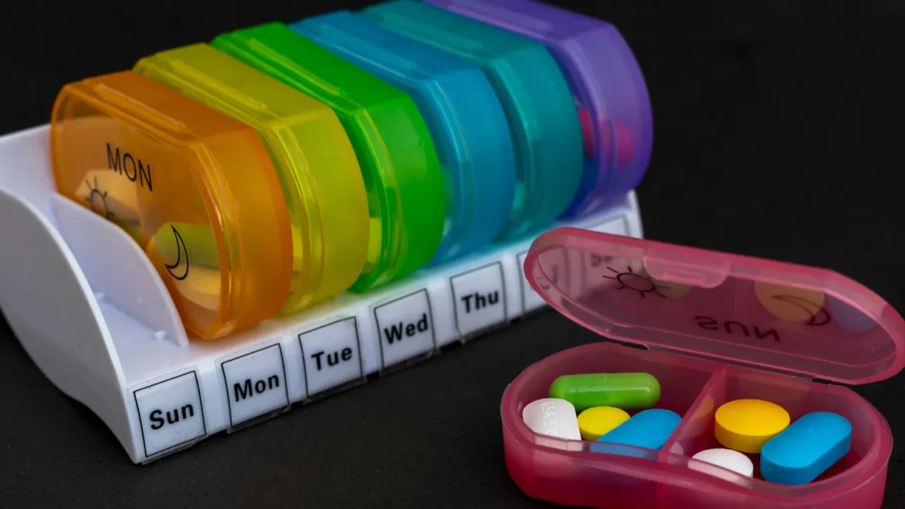 daily drug dose or pills organizer boxes for a complete