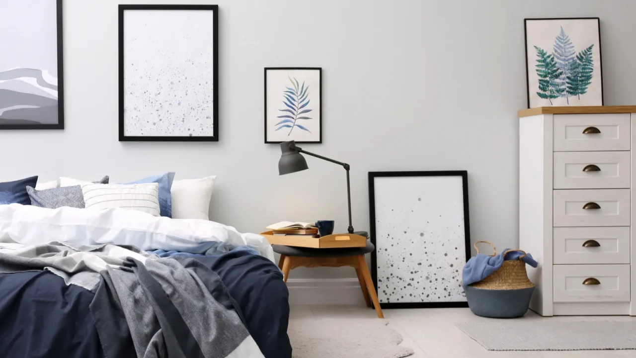 large bed with stylish linens in room