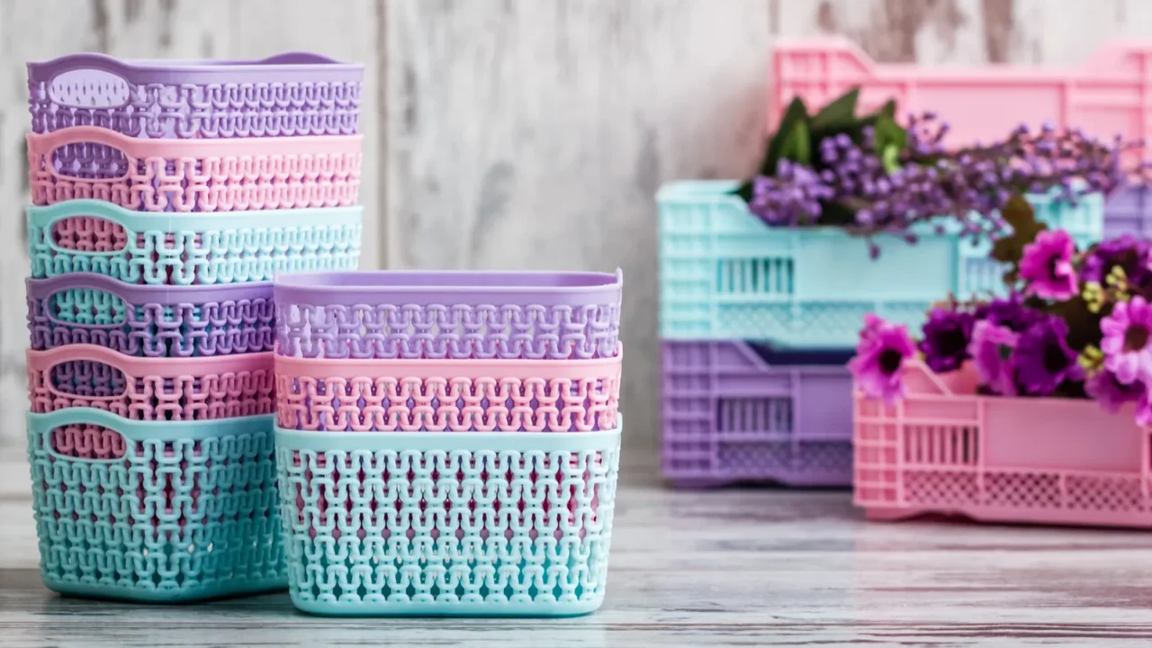 Colorful miniature storage baskets stacked together.