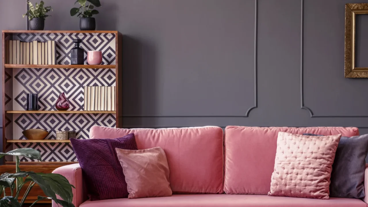 satin pillows on a pink velvet sofa in a luxurious