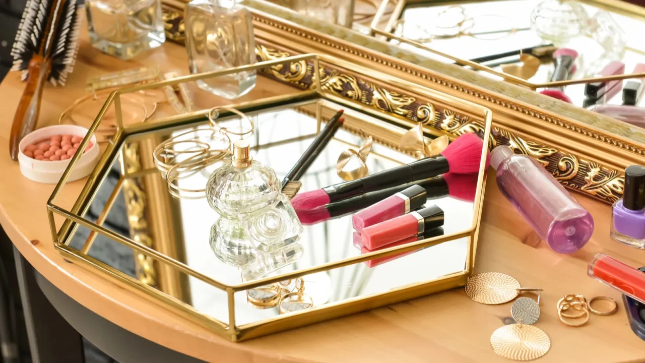 table with cosmetics in modern makeup room