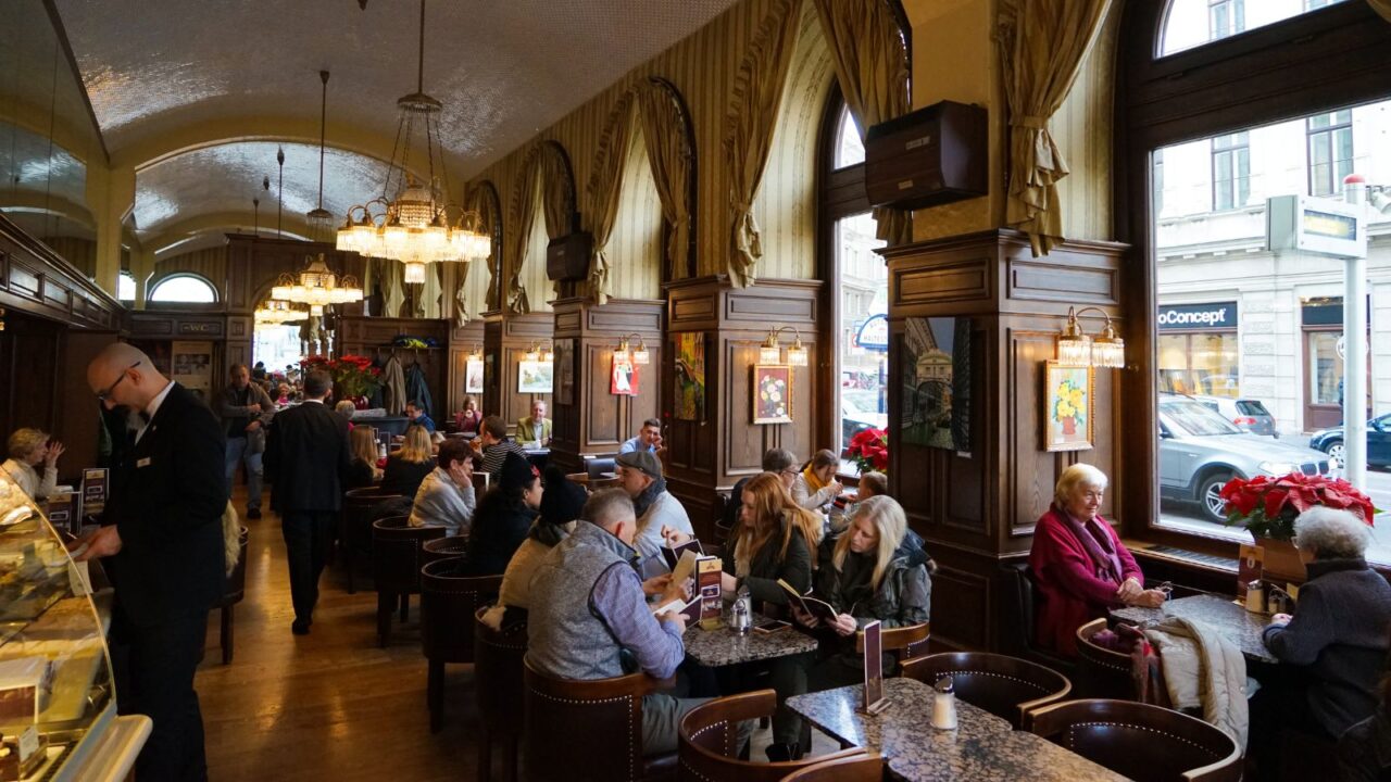 Interior of Cafe Schwarzenberg, one of Vienna's famous coffeehouses.