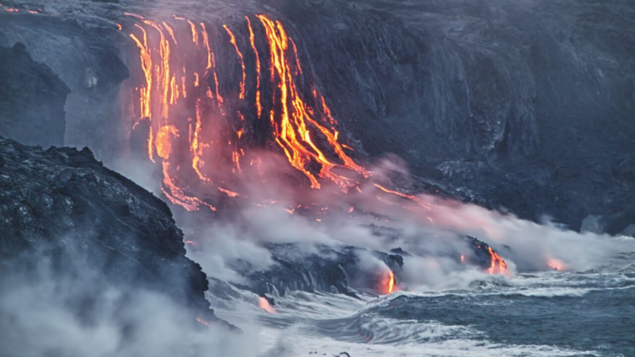 Lava erupting into Pacific Ocean in Hawaii Big Island.