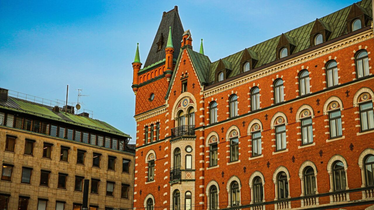 The historic Nobis Hotel in Stockholm, Sweden, with its brick facade and traditional architecture.