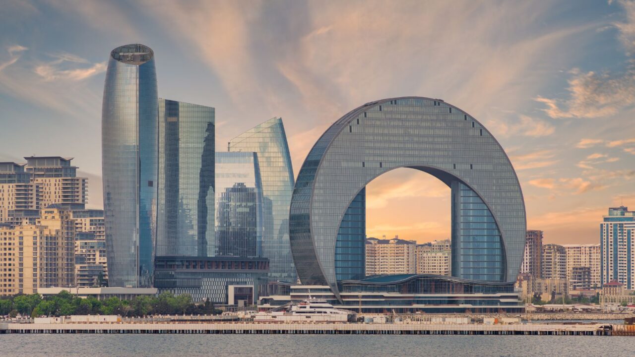 The modern Crescent Hotel in Baku, Azerbaijan, featuring a distinctive crescent-shaped design.