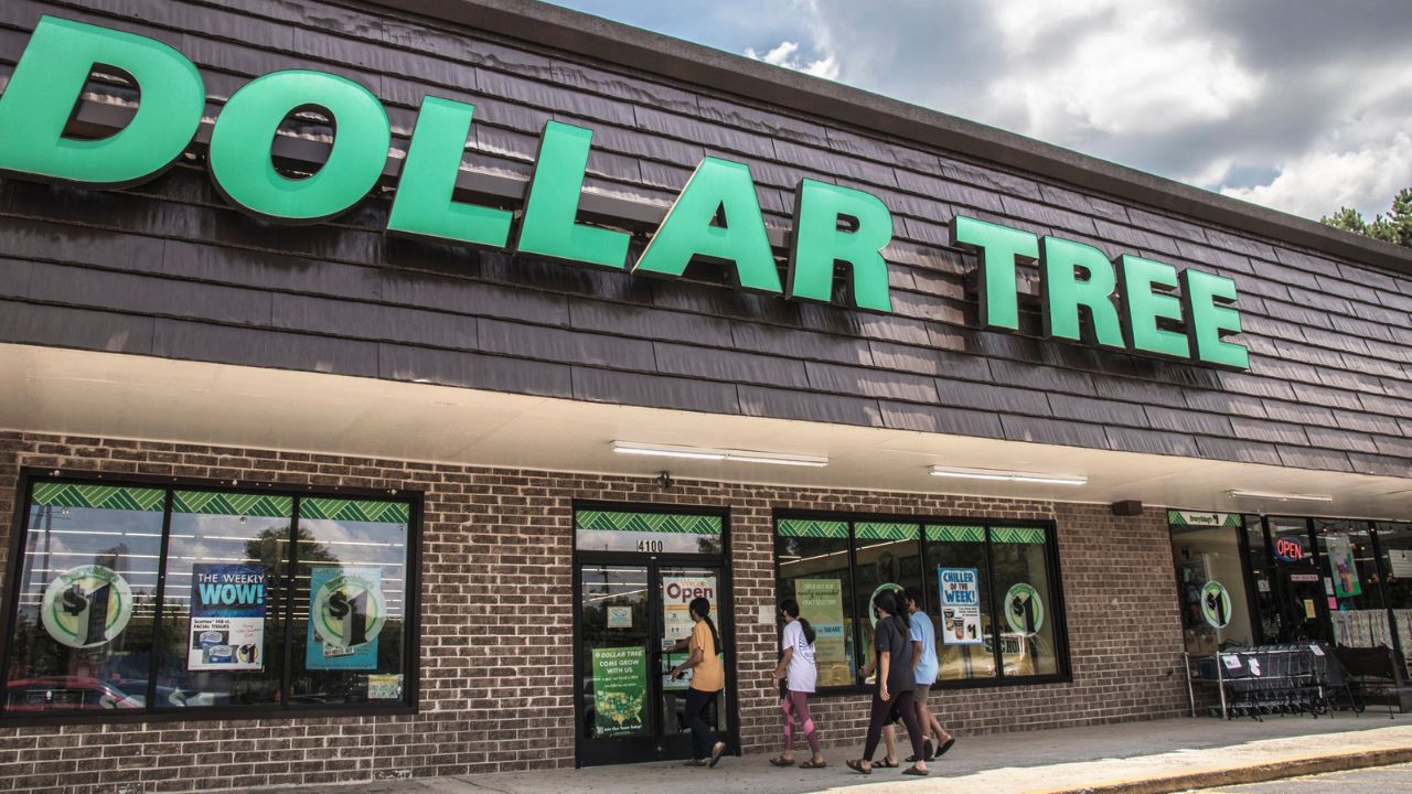 Dollar Tree storefront with customers entering.