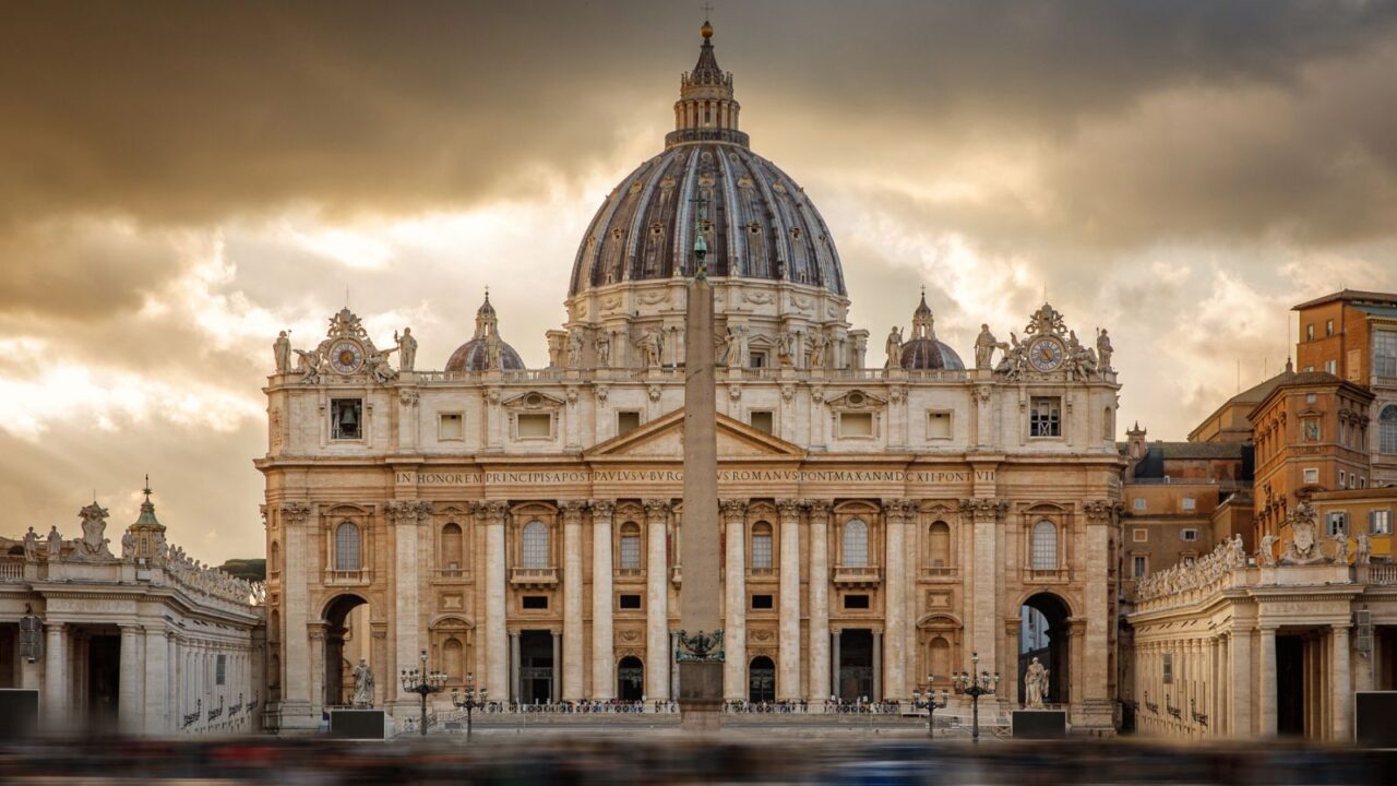 Blurred people in St. Peter's Square in the Vatican. Crowd near Pope Cathedral