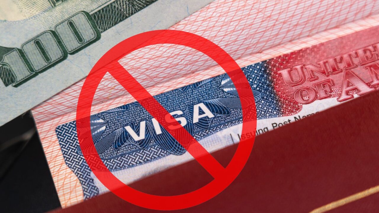 Ban sign on United States of America visa.