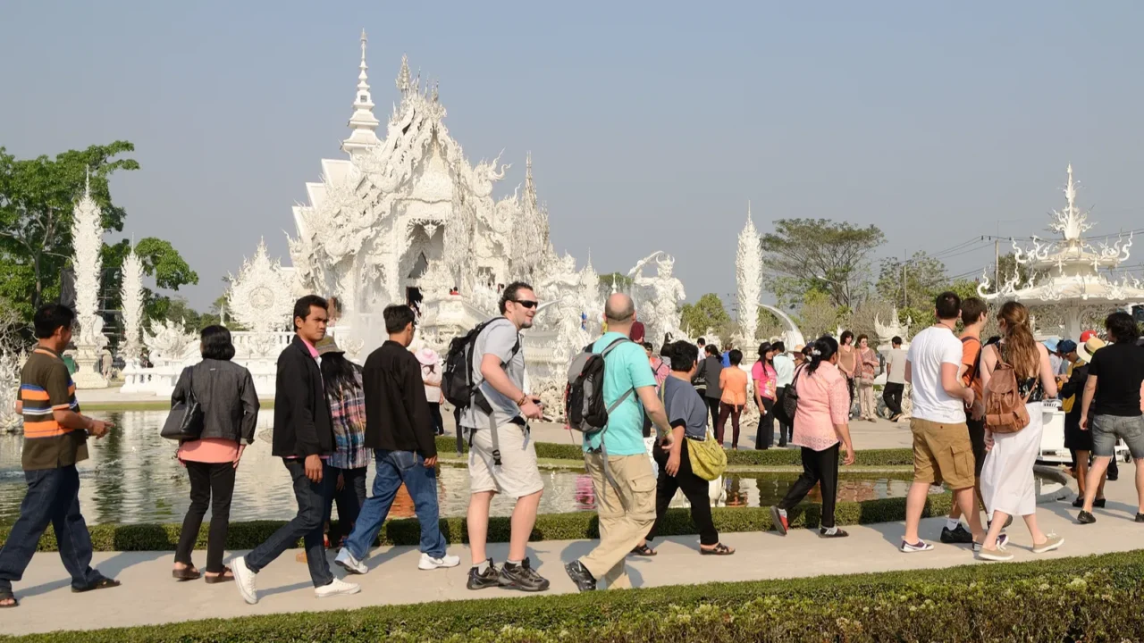 chiangrai thailand  mar 2 unidentified travelers visit wat rong