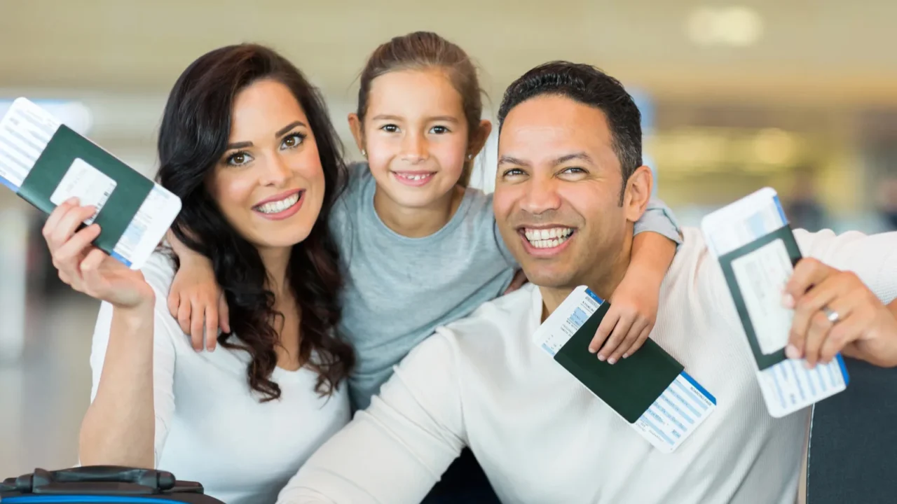family holding boarding pass