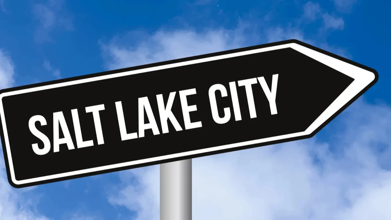 salt lake city road sign on cloudy sky background