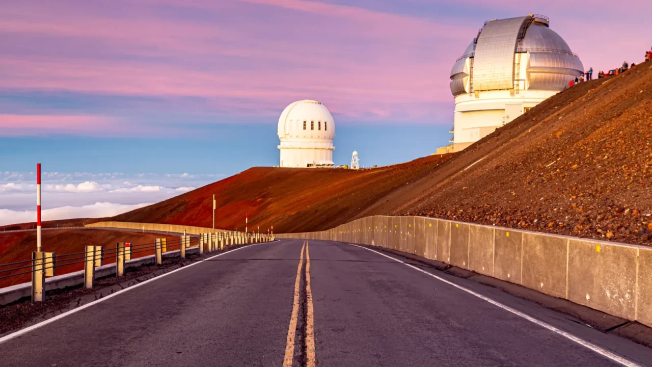 sunset of mauna kea observatory in big island hawaii