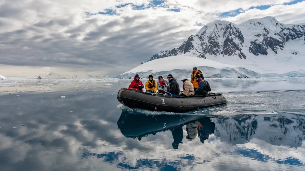 adventure tourists  lamaire channel  antarctica