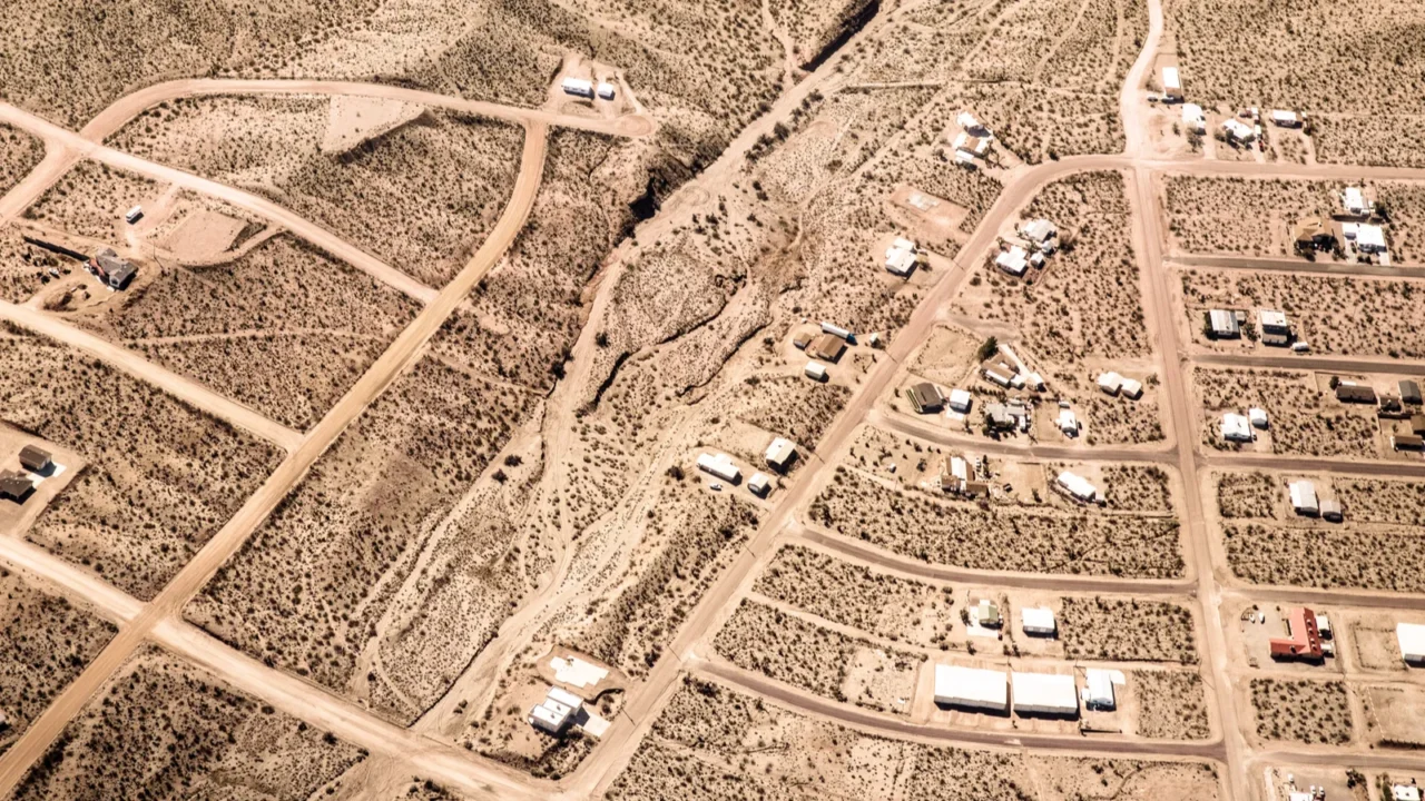 aerial photography over nevada mojave desert with roads and town