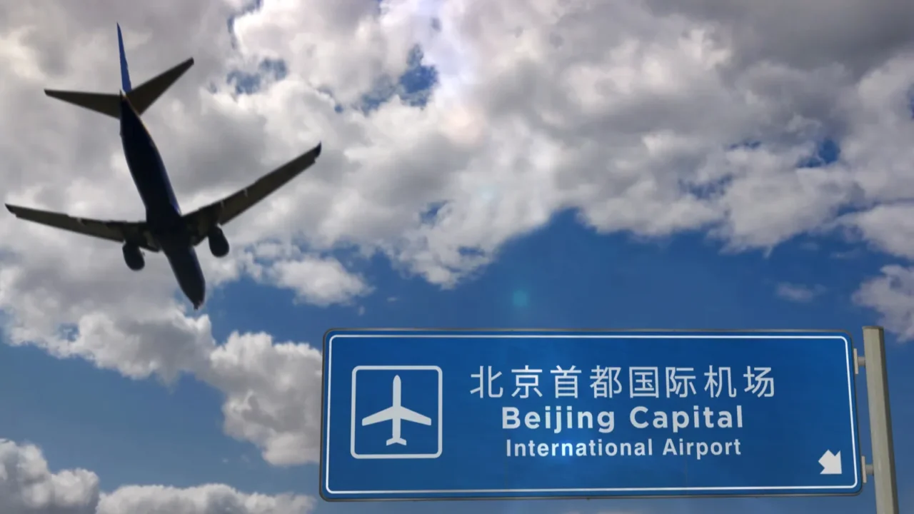 airplane silhouette landing in beijing pek china city arrival with