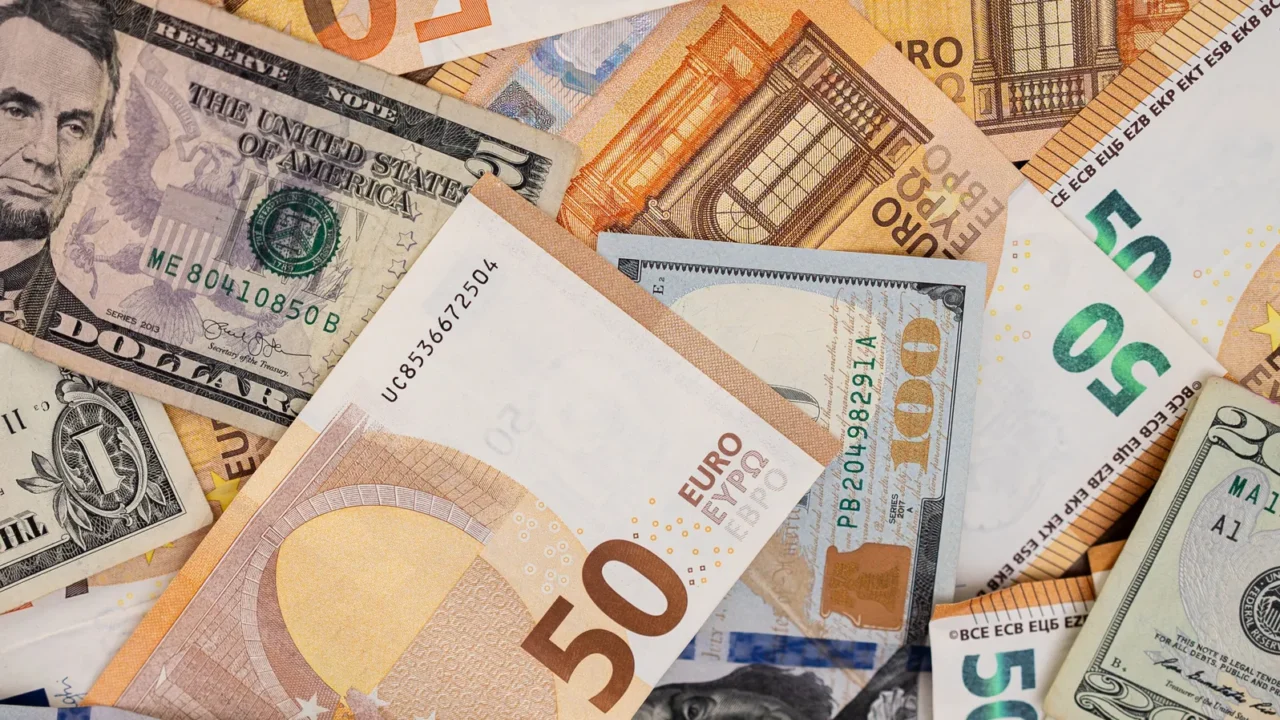 assortment of euro and us dollar banknotes in various denominations