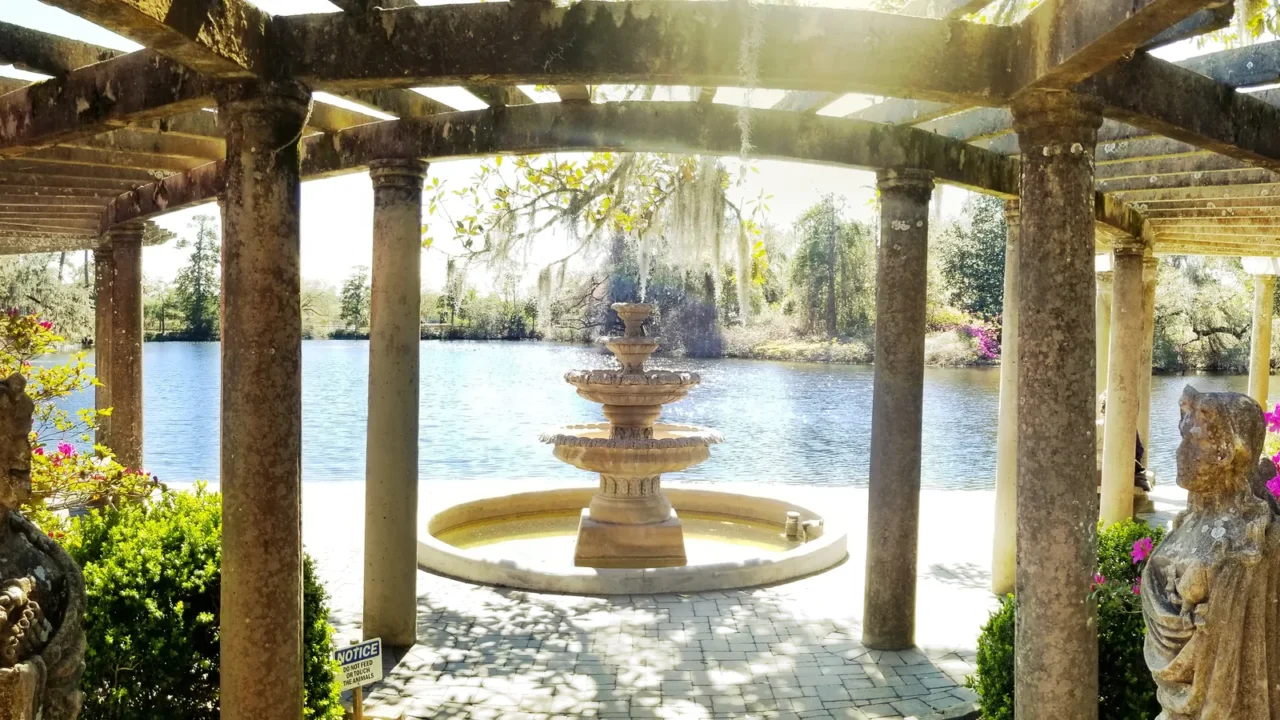 beautiful fountain and trellis on the lake in airlie gardens