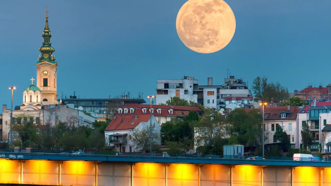 cityscape of belgrade in night of full moon
