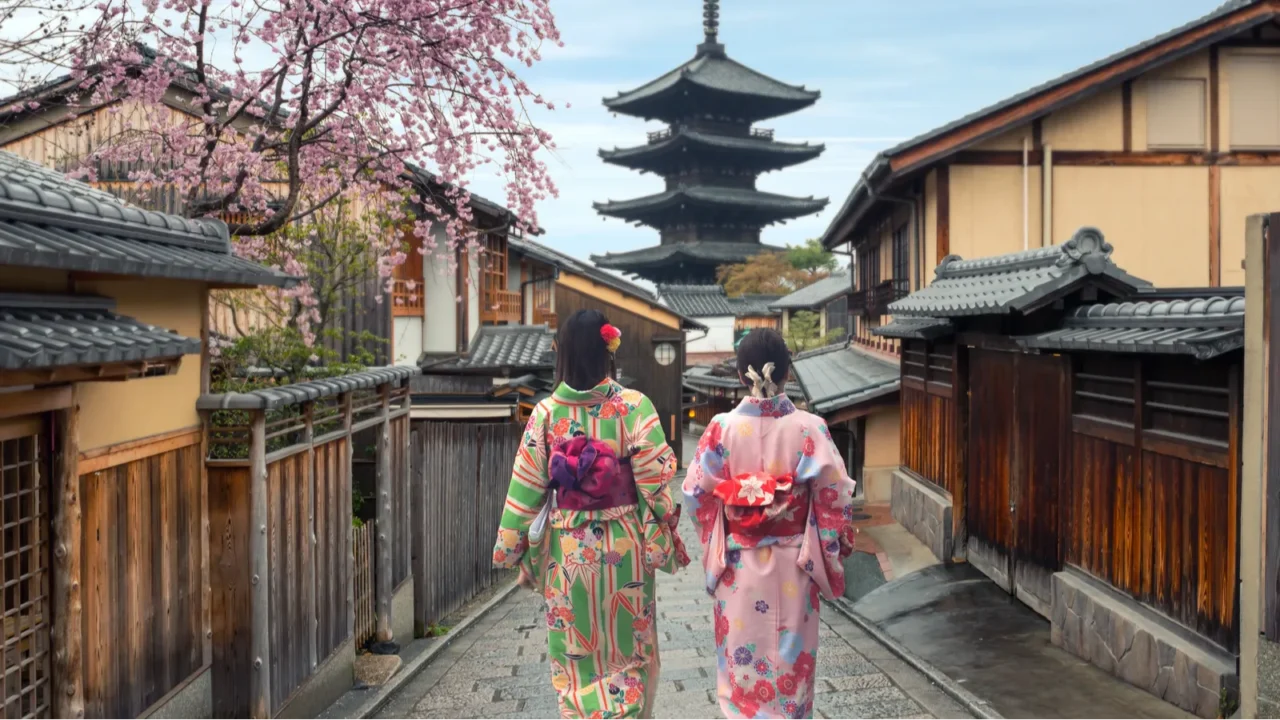 Couple asian women wearing traditional japanese kimono in Yasaka Pagoda and Sannen Zaka Street in Kyoto, Japan.