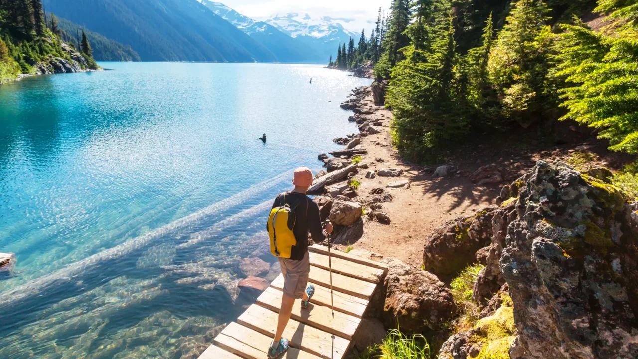 Hiking man in the mountains in Canada.