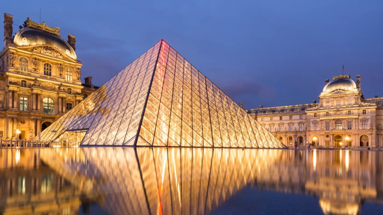 louvre museum at twilight in summer