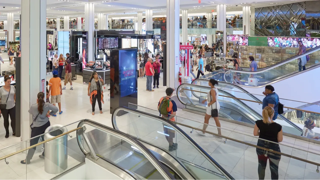 macys department store interior cosmetics area with escalators in new